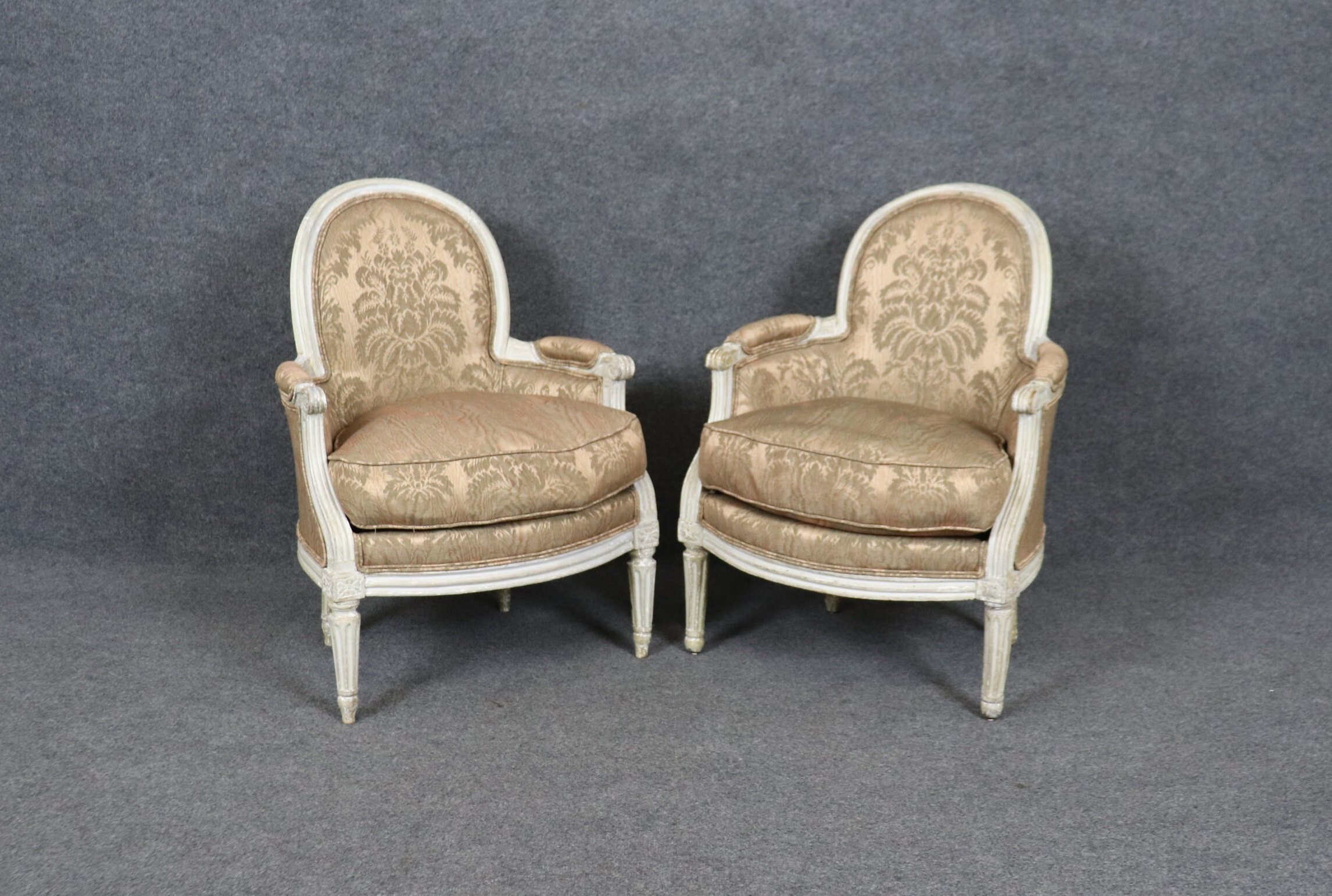 Pair of 18th Century Louis XVI White Paint Decorated Bergeres, Armchairs