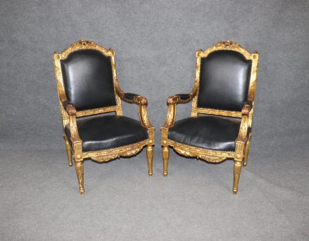 Vintage Louis XVI Style Armchairs: Carved Gilt with Black Upholstery, Pair