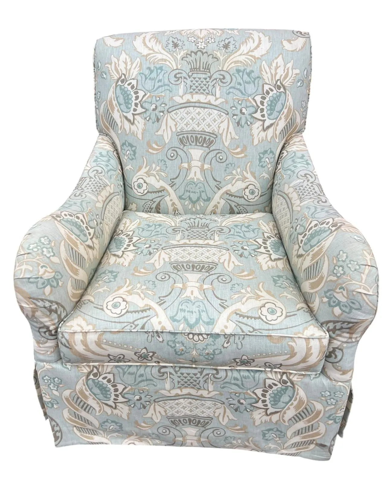 Swivel Rocker club chair in coastal, soft color palette
